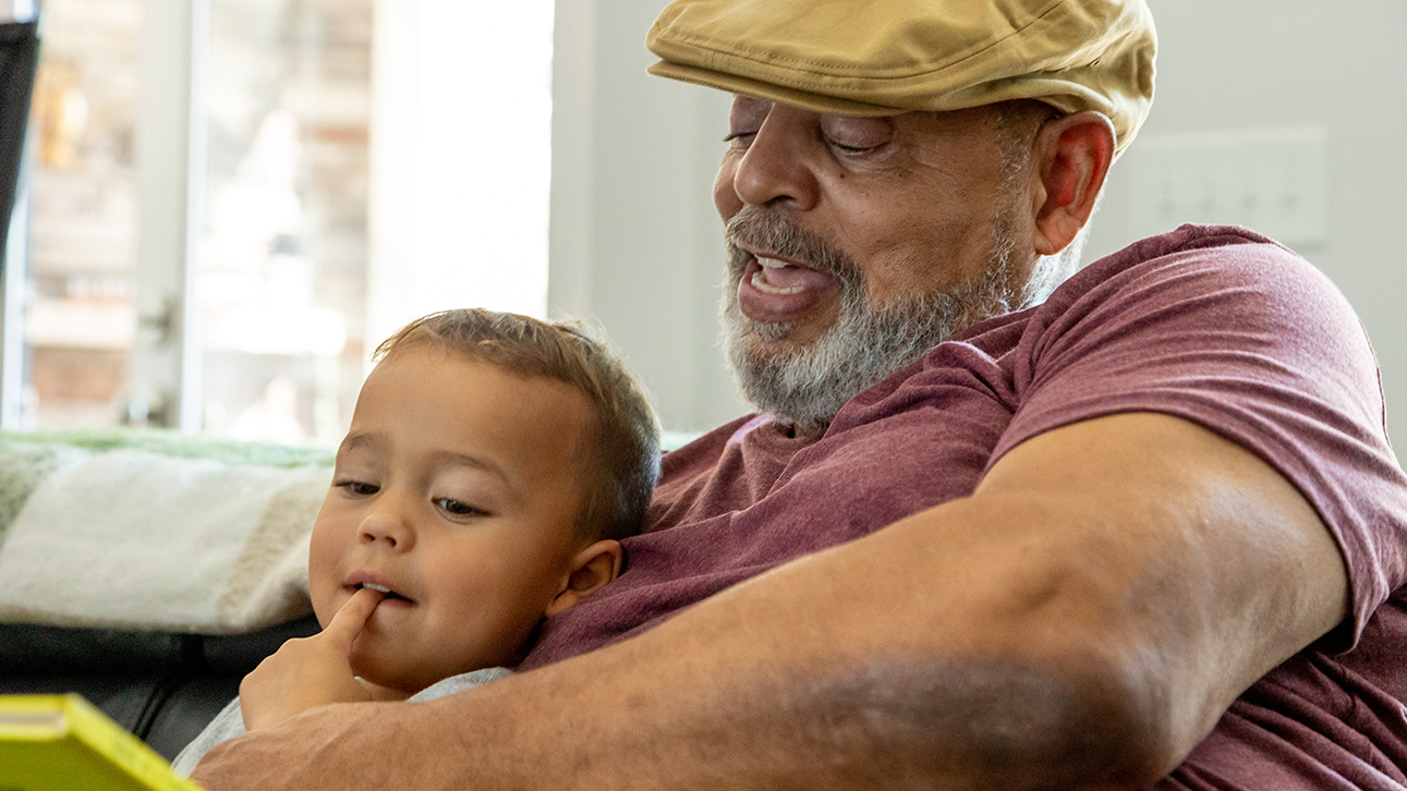 A grandfather reviews his Horizon II annuity performance with his grandson