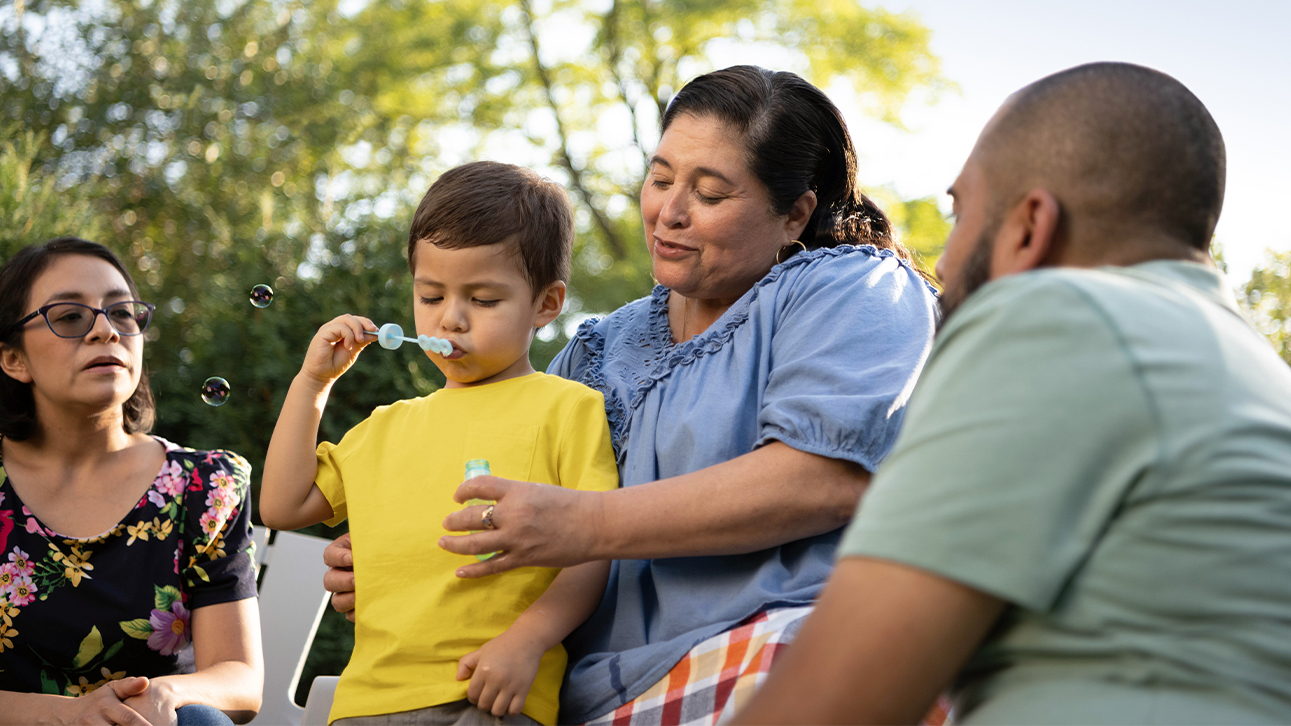 A family celebrates a moment together while talking about Zone Income annuities