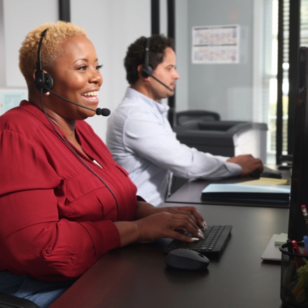 A claims phone agent assisting customers.