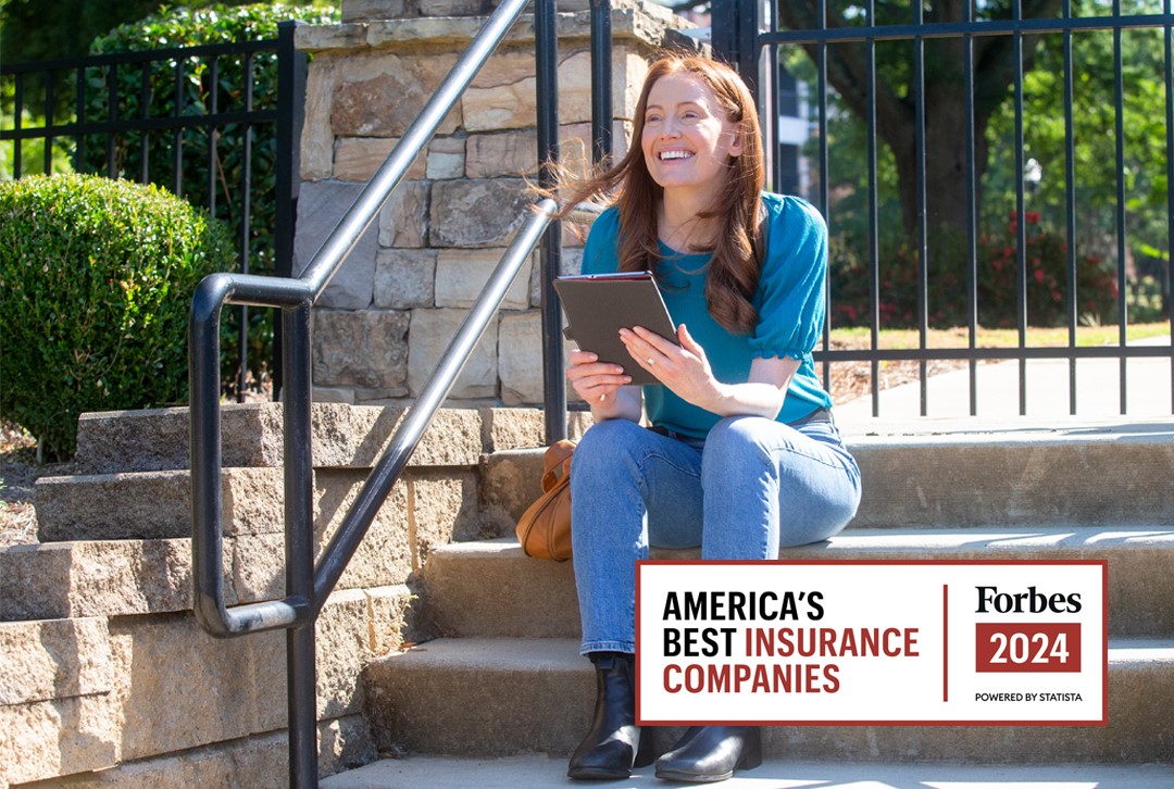 Woman smiling with text overlay announcing TruStage chosen as one of Forbes 2024 list of America's best insurance companies