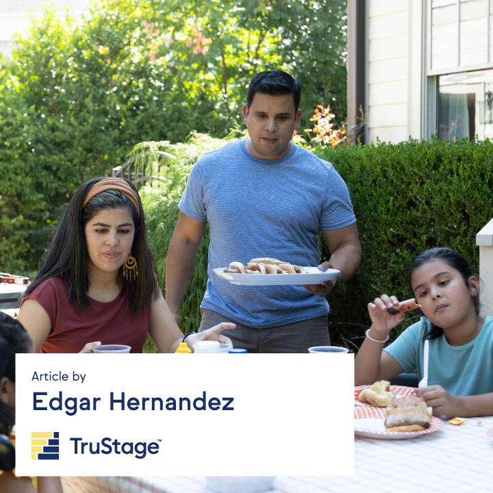 Hispanic family enjoying a cookout