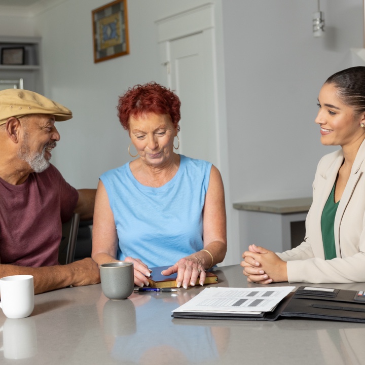 A couple meeting with a claims representative