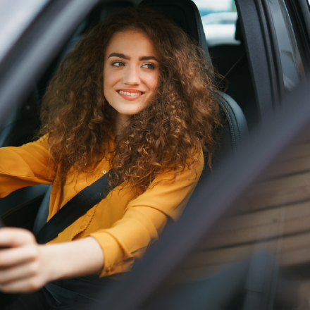 A woman driving her car