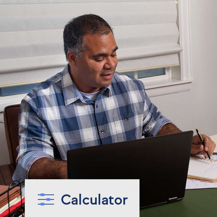 A man paying his credit card bill online