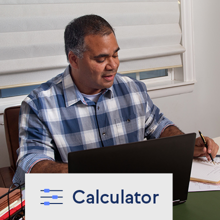 A man paying his credit card bill online