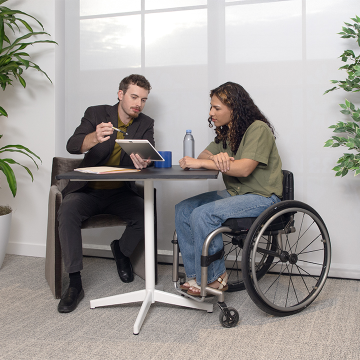 A woman having a meeting with her financial planner