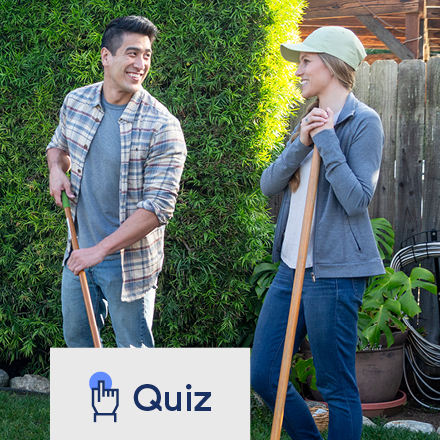 A man and woman doing yardwork