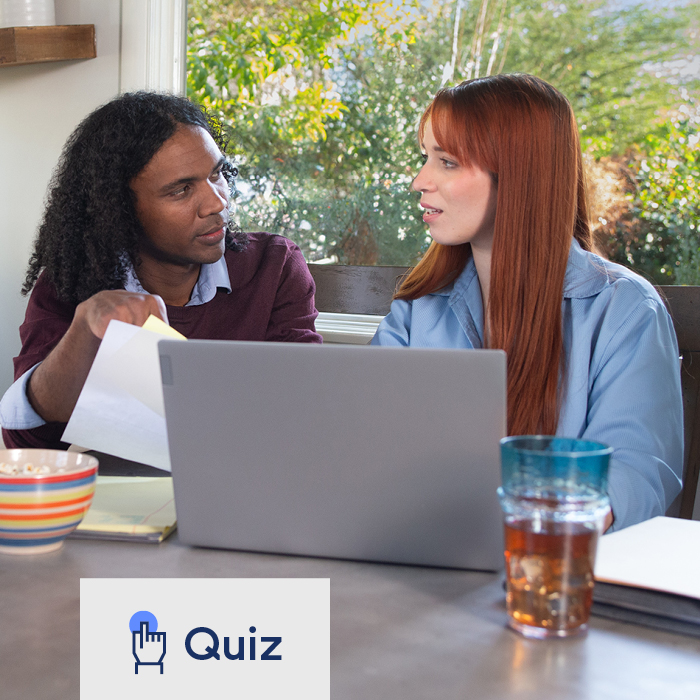 A husband and wife completing TruStage's term vs. whole life quiz