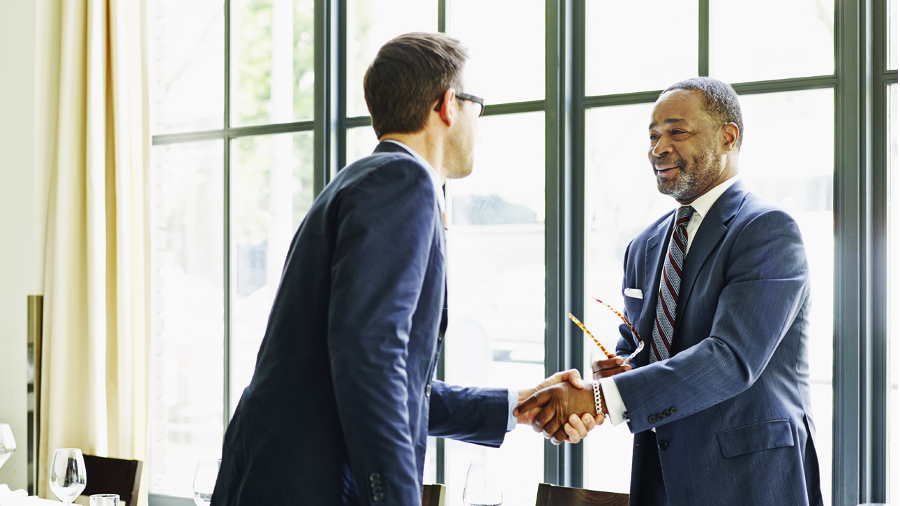 Two people shaking hands