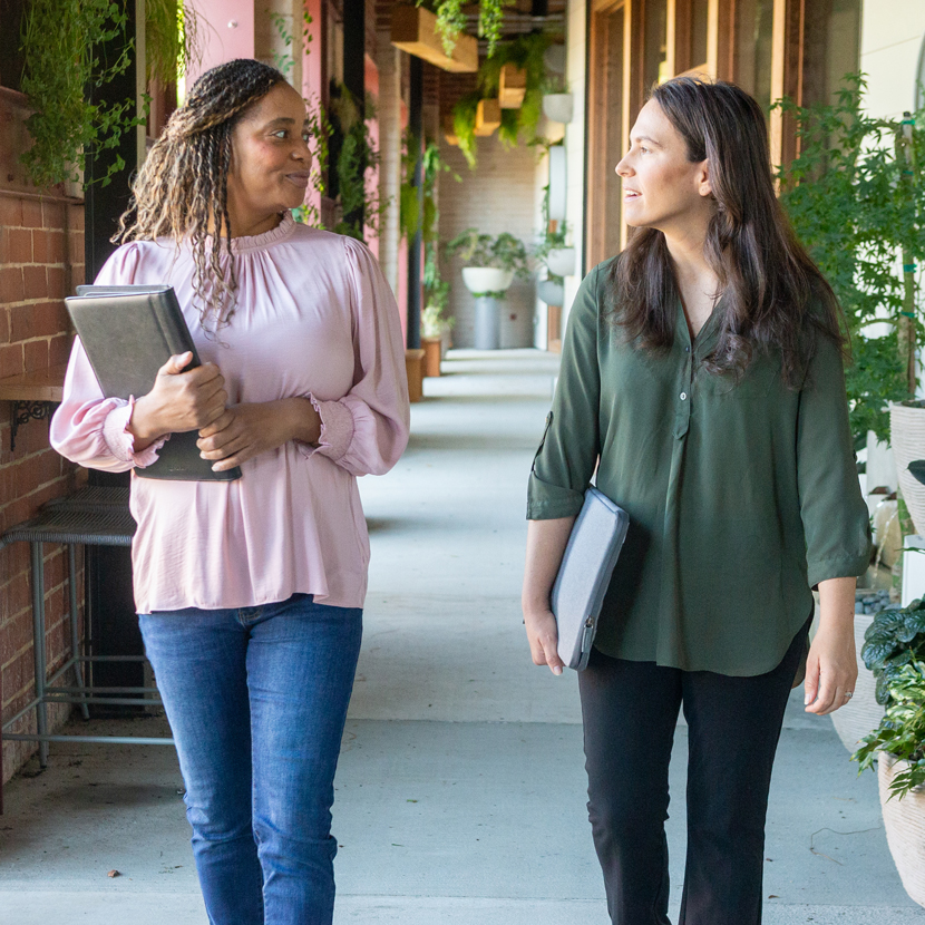 Two employees walking