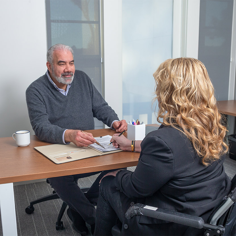 Two people discuss TruStage retirement solutions